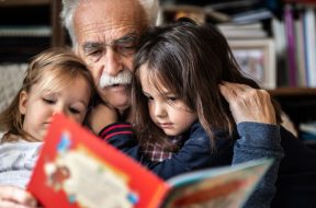 Grandpa-reading-with-grandchildren.jpg