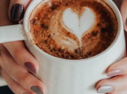 Woman-holding-mug-of-hot-chocolate.jpg
