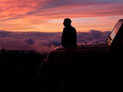 Man-looking-at-sunrise-by-Karl-Fredrickson-Unsplash.jpg
